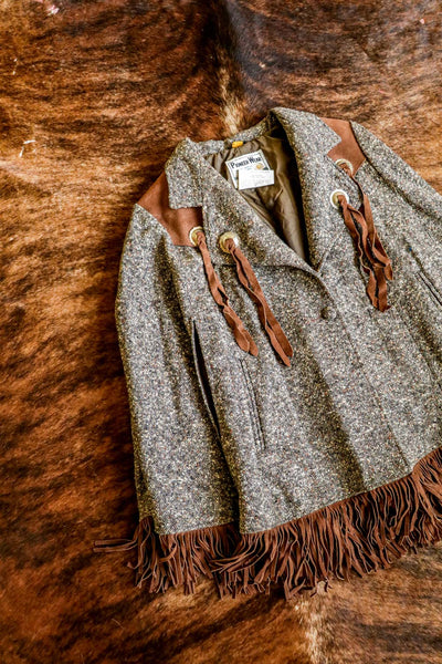 vintage pioneer wear tapestry and brown leather fringe western cape medium