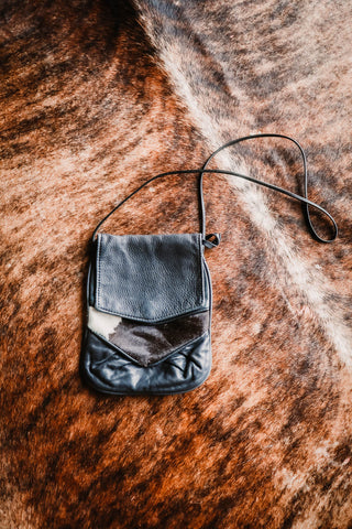 vintage cowhide and black leather purse